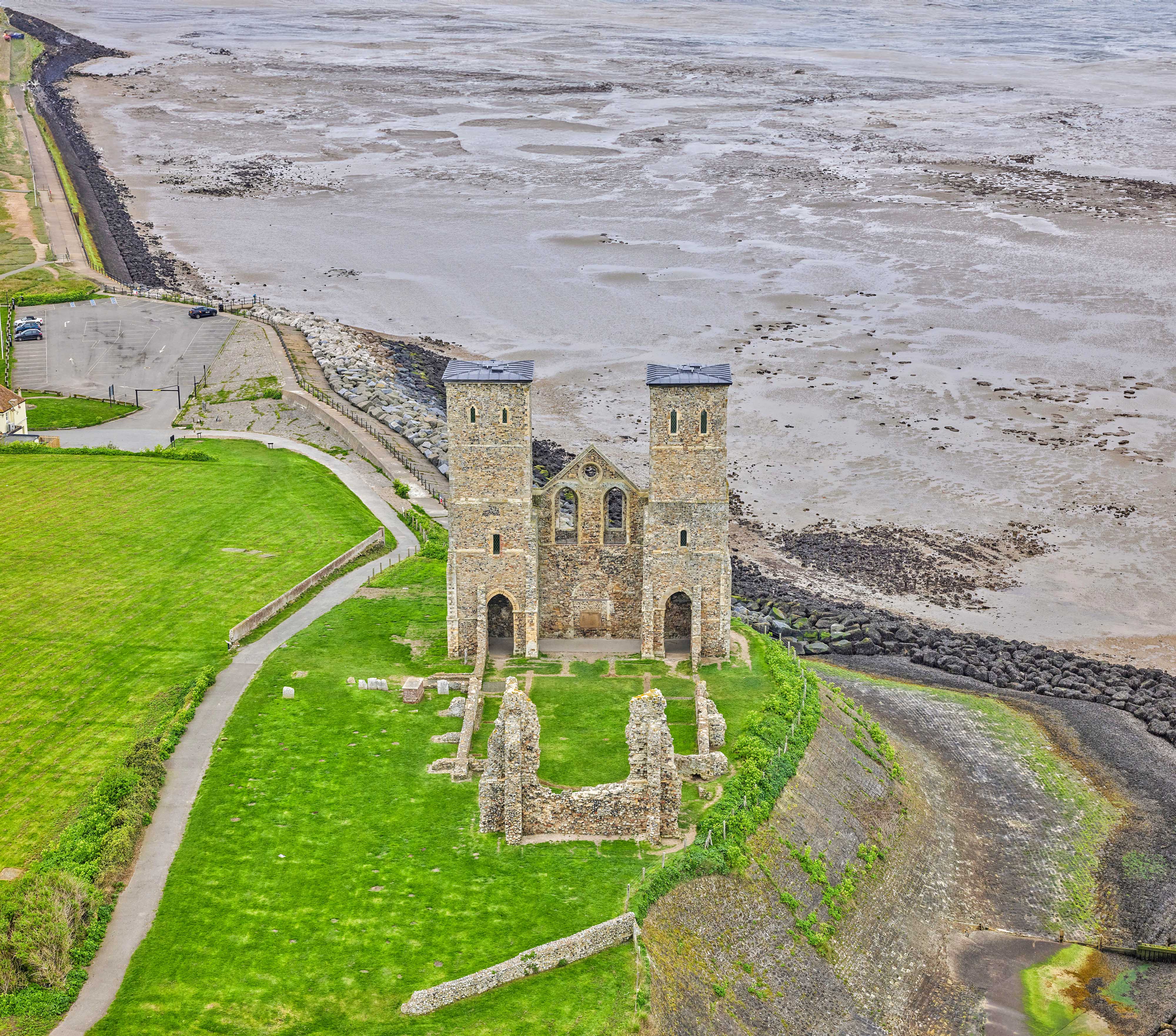 Aerial photo of Reculver Towers and Roman Fort next to the coast