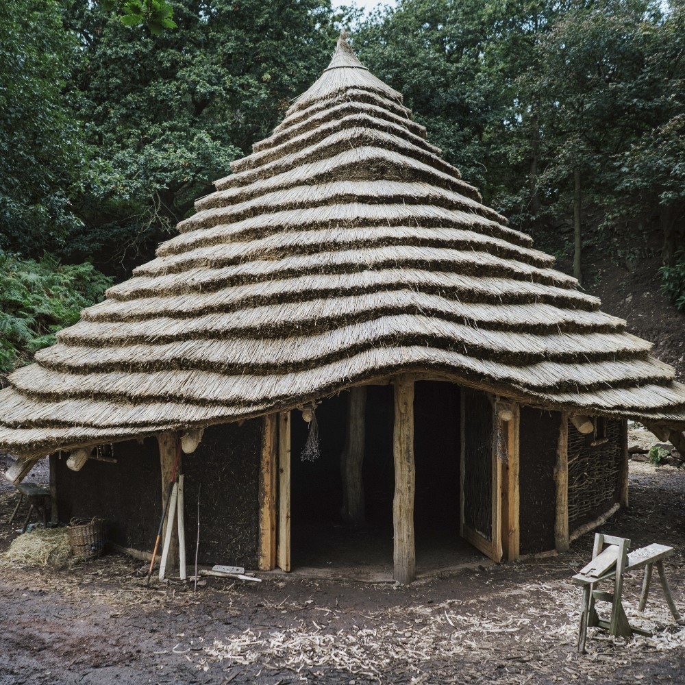 Photo of the exterior of the recreated Neolithic roundhouse at Beeston Castle and Woodland Park