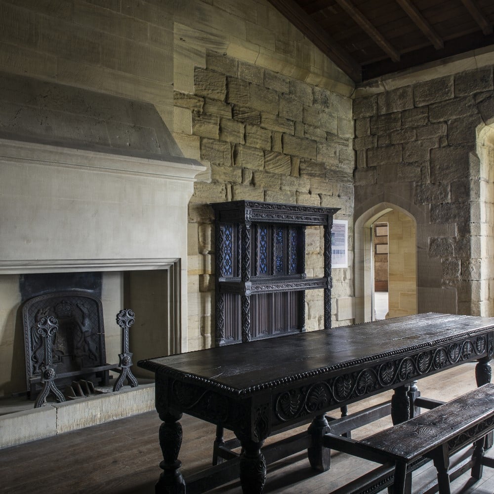 Photo of Tudor furniture in the Duke's Rooms at Warkworth Castle