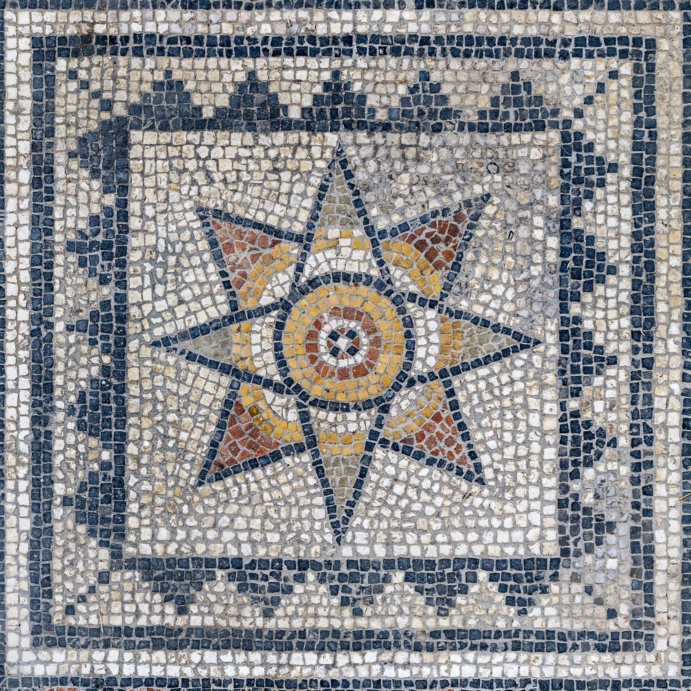 Bird's-eye-view photo of a patterned Roman floor mosaic